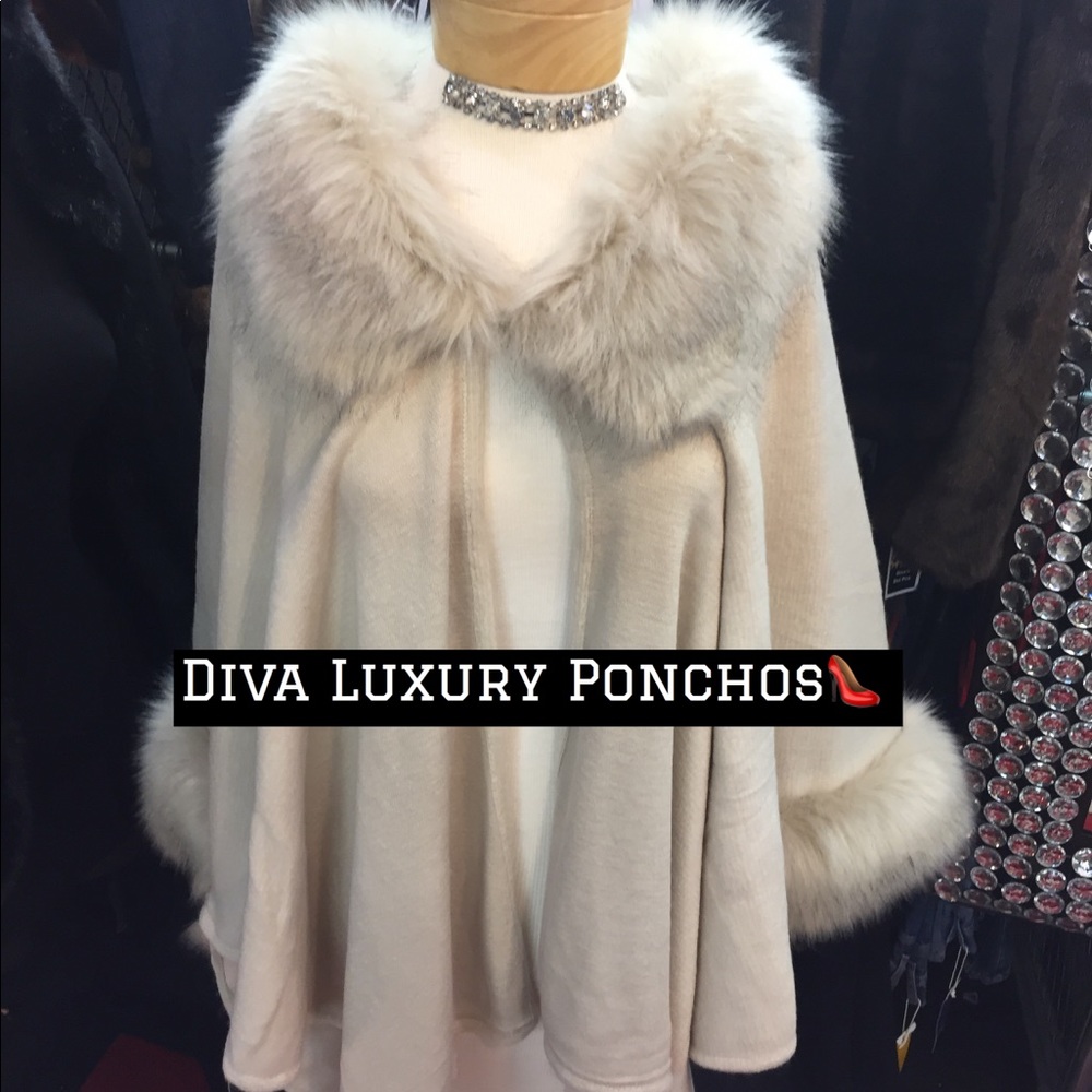 Poncho with Fur collar... one size fits all.. $79.